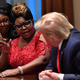 Lynnette “Diamond” Hardaway and Rochelle “Silk” Richardson with Donald Trump at the White House in February 2020.